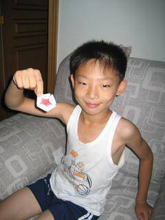 亲近科学,动手实验(四)——纸睡莲也会绽放作文