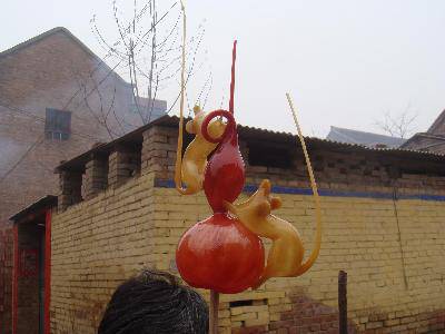 “吹糖人”——儿时的情景再现作文