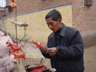 “吹糖人”——儿时的情景再现作文