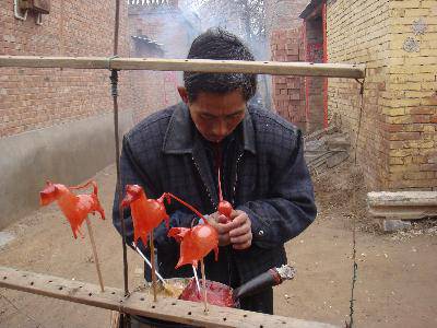 “吹糖人”——儿时的情景再现作文