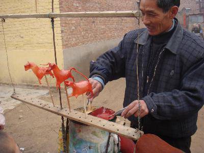 “吹糖人”——儿时的情景再现作文