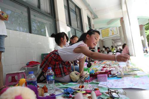 “跳蚤市场”的收获(含图片)作文