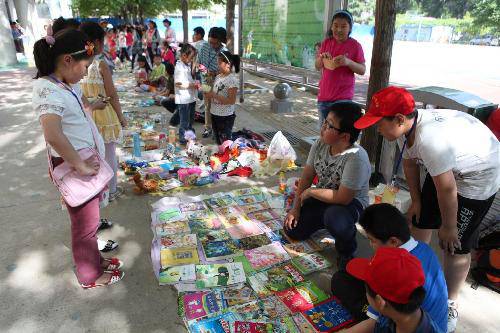“跳蚤市场”的收获(含图片)作文